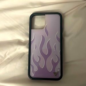 This is a purple phone case from wolf flower for an iPhone 12.